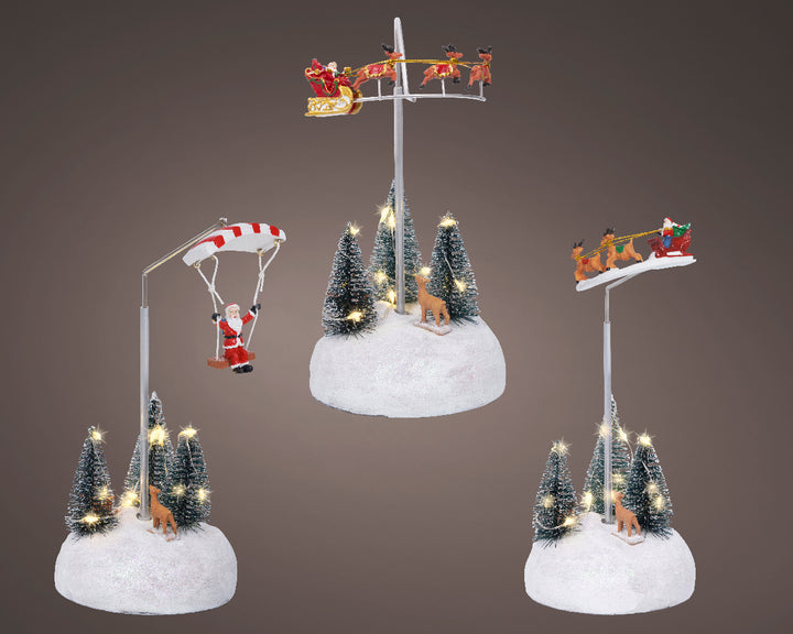 Scenario Natalizio con Babbo Natale e Slitta – Micro LED Bianco Caldo – 3 Assortimenti (cod. 489073) – Kaemingk
